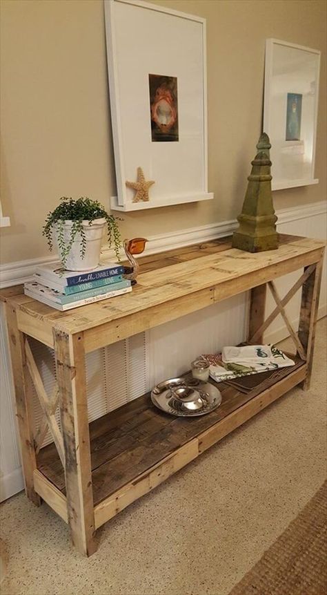 a large rustic console of pallet wood with a shelf and planks on the sides is ideal for a vintage space
