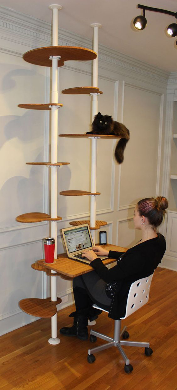 A modern cat tree built of metal pipes and wooden platforms   or you may use cutting boards for the kitty