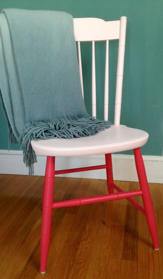 A stylish two tone chair in creamy and red looks catchy and playful and will add color to any space