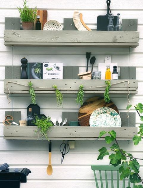 A trio of simple shelves in the kitchen to store eveyrthing you may need, hang stuff and even add greenery   built of pallet wood painted grey