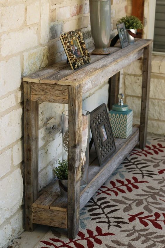 a large rustic pallet console table with a shelf underneath can be built by you yourself