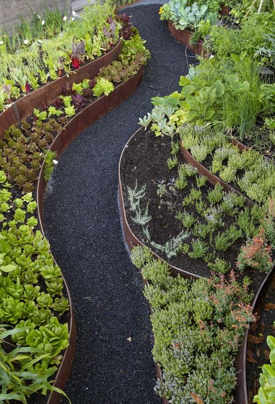 thin patin metal ribbons look amazing with greenery, cacti and succulents and black pathways