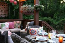 22 bright lanterns and bright and printed pillows are a must to create an ambience on the deck