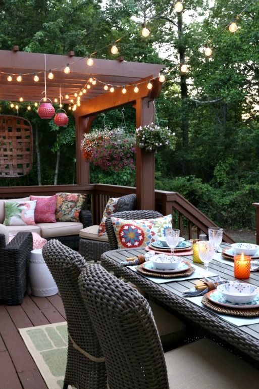 bright lanterns and bright and printed pillows are a must to create an ambience on the deck