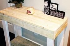23 a simple rustic console table built of pallet wood painted white or stained in a light shade