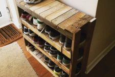 23 a simple rustic shoe rack built of pallet wood features several tiers to accommodate all your shoes, the piec ewill fit even a small entryway