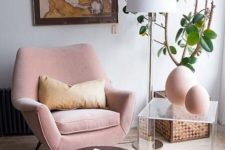 24  a blush mid-century modern chair with curves and angles is a cool piece, and a brown ottoman contrasts it