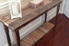 25 a vintage farmhouse console built of pallet wood and exquisite legs taken from another furniture piece