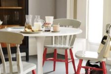 26 vintage off-white chairs and table and living coral legs give an edgy touch to the space