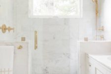 02 a white marble bathroom done with gold fixtures looks flawlessly elegant and very refined