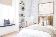 03 a kid’s room accented with a statement wall with catchy printed wallpaper for a boho feel