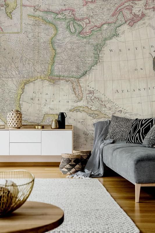 an oversized vintage map wall mural for a boho living room, it will always inspire you to travel
