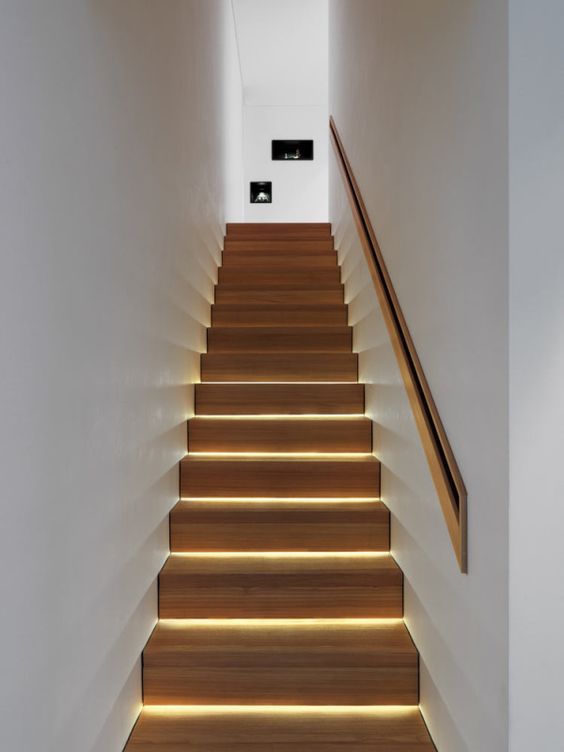 highlight each step integrating strip lighting to make your staircase look contemporary and very bold