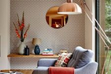 05 a mid-century modern living room accented with catchy printed wallpaper on one of the walls