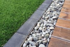 05 a pebble and dark brick border will fit a modern garden and will make it look edgy and stylish