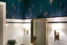 05 gold fxitures, a gold mirror frame, gold lamps and wall decor with gold stars that matches