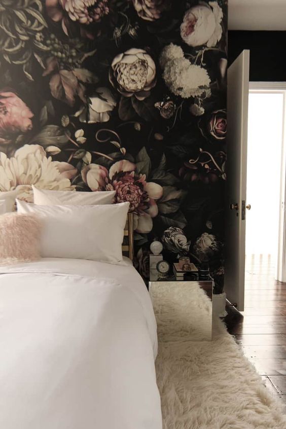 a trendy moody bedroom with ivory as the main color, blush as the secondary one and dark tones for more drama