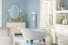 07 ivory as the main shade, blue as the secondary and some tan touches to make up a welcoming bathroom