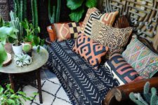 08 printed colorful pillows and matching sofa upholstery make the space boho-like