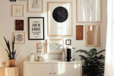 10 a stunning boho gallery wall with mismatching frames and various signs and works of art