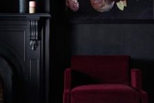 11 a moody nook spruced up with a bold florla artwork and a burgundy chair for more color