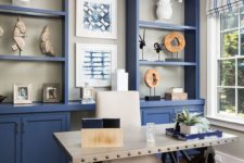 11 built-in blue shelves plus closed storage units won’t take much space and will give you much storage