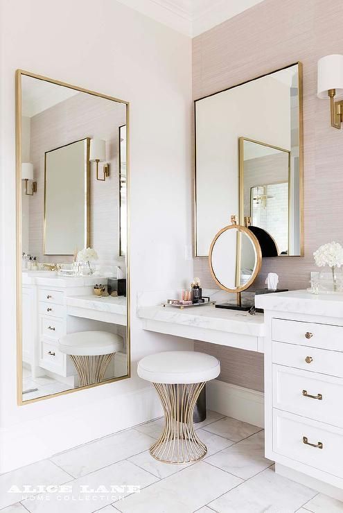 three different mirrors in gold frames make this beauty nook bold and very refined, and a matching stool adds even more