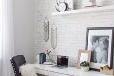 12 a boho meets mid-century modern home office nook is made catchier with white brick and artworks