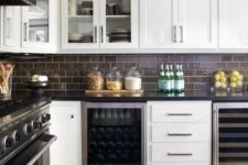 12 dark chocolate subway tiles with white grout make up a contrasting and bold kitchen backsplash