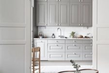 13 a grey kitchen is a huge trend as grey is the new black and it looks soothing and relaxing