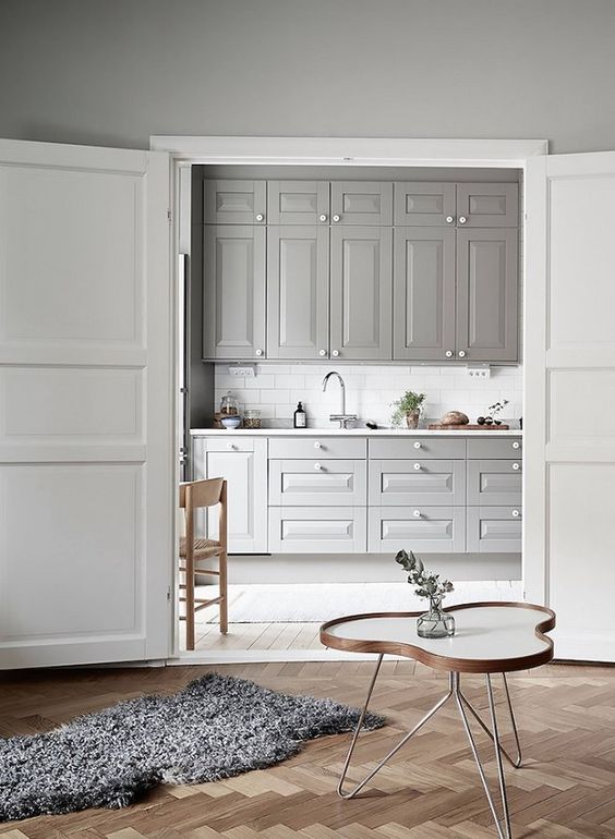 a grey kitchen is a huge trend as grey is the new black and it looks soothing and relaxing