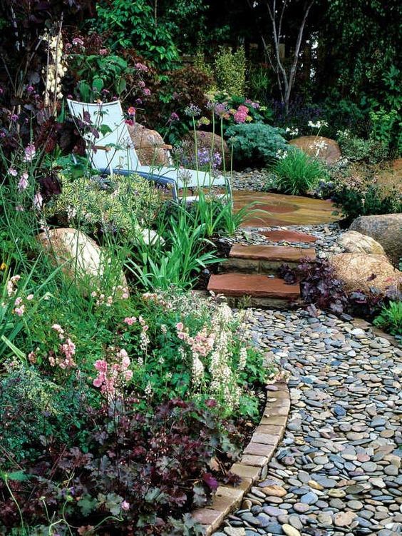 brick edging and a pebble path is a stylish idea - you'll get a natural feel and a touch of well-grooming at the same time