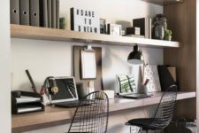 13 built-in shelves and a built-in desk for a shared minimalist home office, which won’t take much space