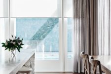 13 neutral roller shades look very well with curtains of any color and texture blocking excessive light