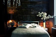 13 some wall and table lamps in this dark and moody bedroom create a cozy ambience and you’ll want to stay here longer