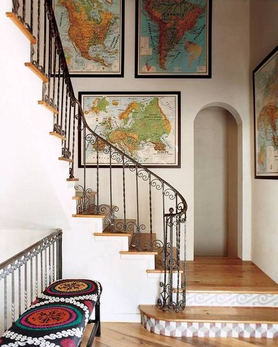 a gallery wall with various maps is a cool idea to substitute a traditional gallery wall with photos and artworks