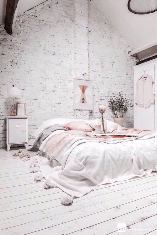 A white brick statement wall makes the girlish bedroom more Nordic and harsh
