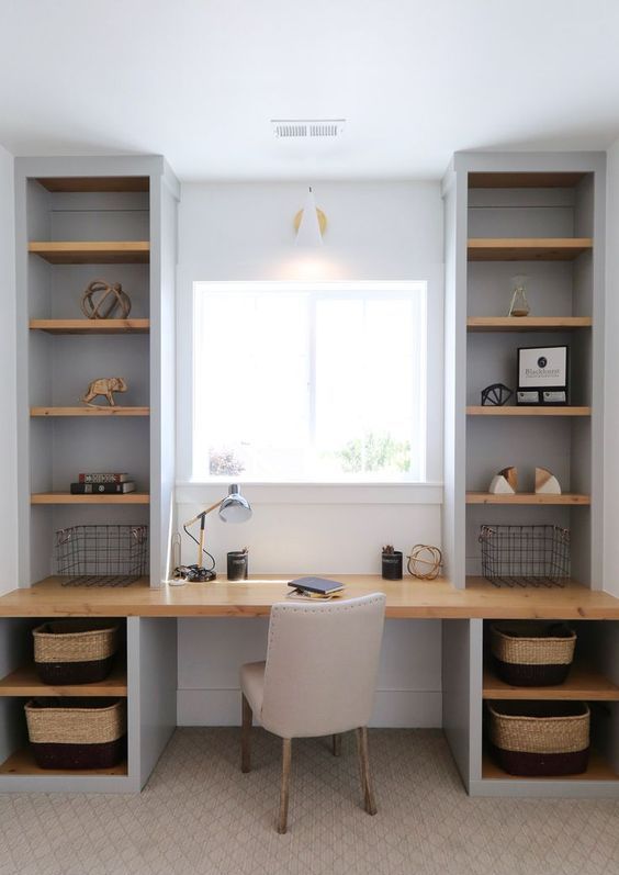 Built in wall shelves and a built in desk is a perfect idea for a small home office in taupe shades