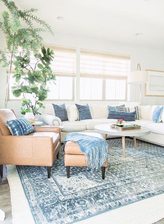 incorporate some comfortable leather and upholstered furniture into your coastal living room