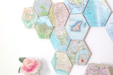 16 a world map of hexagon tiles that show the places where youve been and a city map clock to match