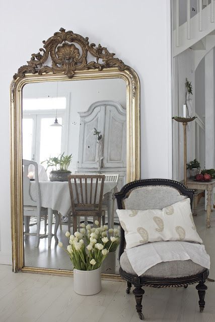 double your space, fill it with light and add refined elegance with a gold framed mirror like this one