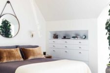 16 the bedroom is decluttered with some built-in storage units and additional negative space