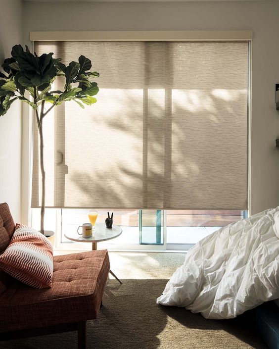neutral roller shades block the excessive sunlight very well and can be removed anytime to make the space connected to outdoors