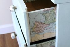 20 a dresser with vintage maps decoupaged is a fun idea that doesn’t look too much – only for travel maniacs
