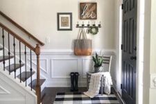 20 a small farmhouse entryway with a buffalo check rug, which is a cool idea to highlight the style