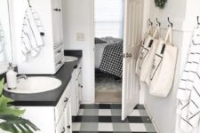 22 a simple monochromatic bathroom with a buffalo check rug to highlight the farmhouse style of the space