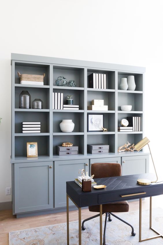 a slate blue shelf and storage unit is a great idea to add a touch of subtle color and give you storage space