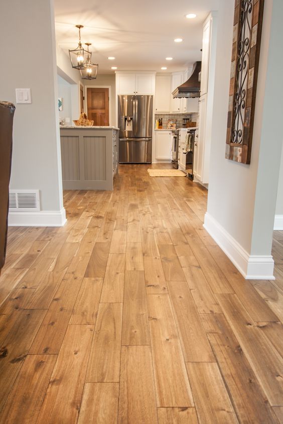hardwood floors in some rich shade will make a statement in your space highlighting its beauty