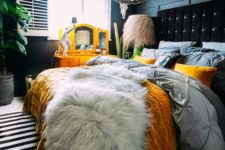 24 many layered textiles in blue, mustard, white and black are amazing to create a bedroom oasis of your dream