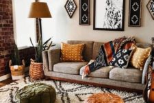 24 tribal artworks, a leather and suede Moroccan ottomans, woven planters and printed pillows to make the space free-spirited